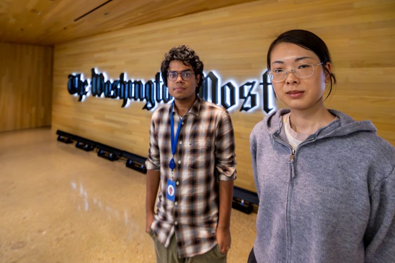 Virginia Tech Ph.D students Sha Li (right) and Shailik Sarkar at The Washington Post.