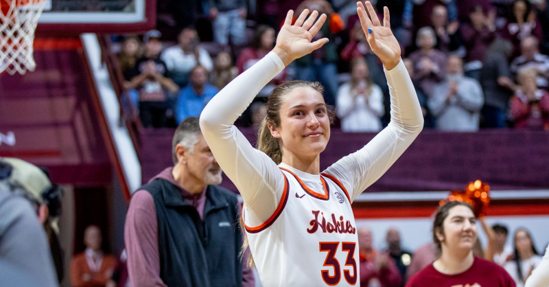 Liz Kitley waves to the crowd
