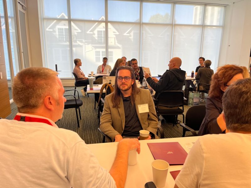 Jacob Grohs at the Swiss higher education delegation visit Jacob Grohs, Associate Professor, Engineering Education and Director, Center for Educational Networks and Impacts , discusses his center's work at lunch during the Swiss higher education delegation's visit to Virginia Tech