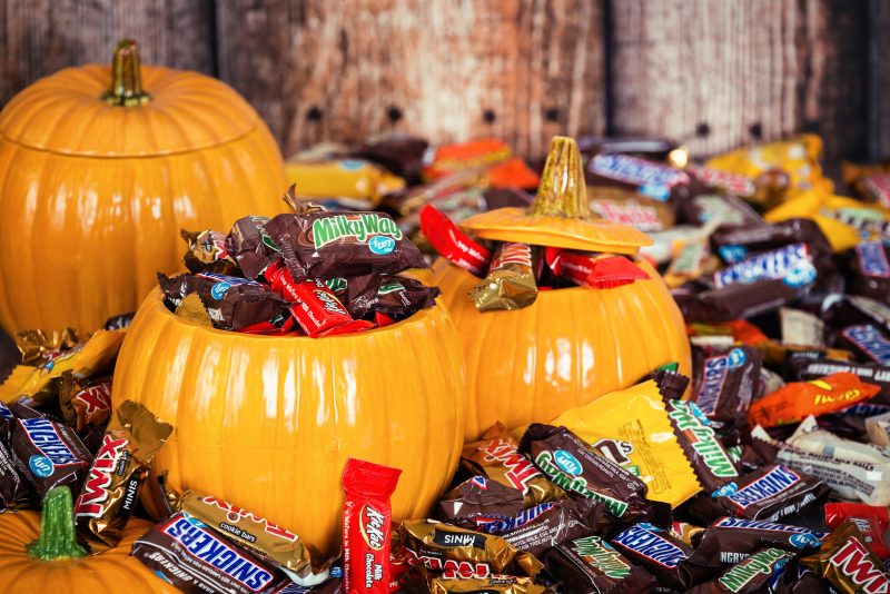 Ceramic pumpkin filled with halloween candy