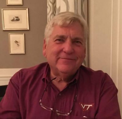 close up of Jimmy Cochrane wearing a VT polo shirt