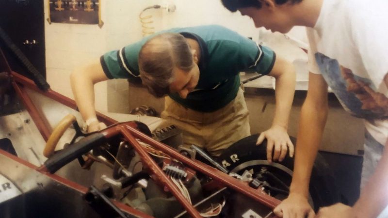 John Bobbitt II and John Bobbitt III with "Gerty" one of the early Formula SAE cars, in Room 3 of Randolph Hall, around 1990. Photo courtesy of John Bobbitt III.