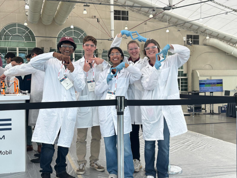 ChemE Cube team competing in competition.