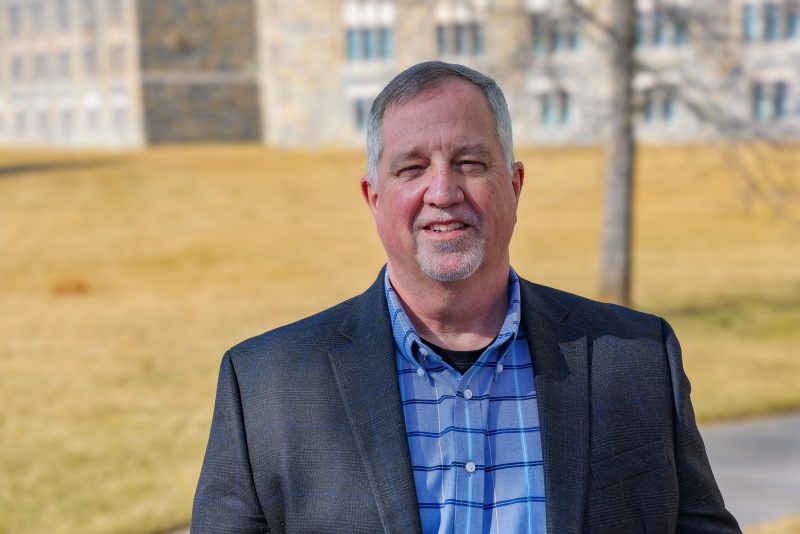 Kevin Rice Clery Compliance Coordinator for Virginia Tech Headshot of Kevin Rice named Clery Compliance Coordinator for Virginia Tech outside with a campus building in the distance.