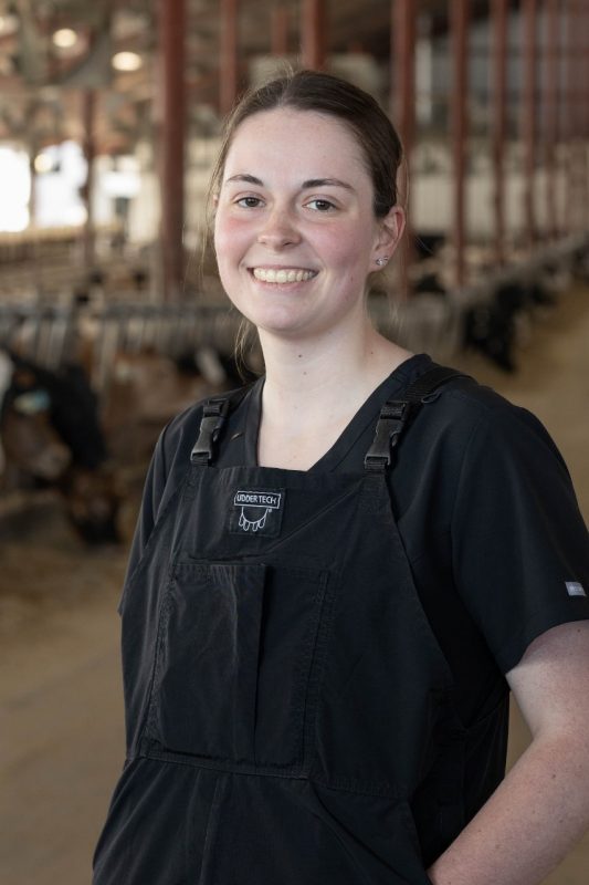 Palpation Team Portrait of Autumn Mullins standing in the Kentland Farms barn