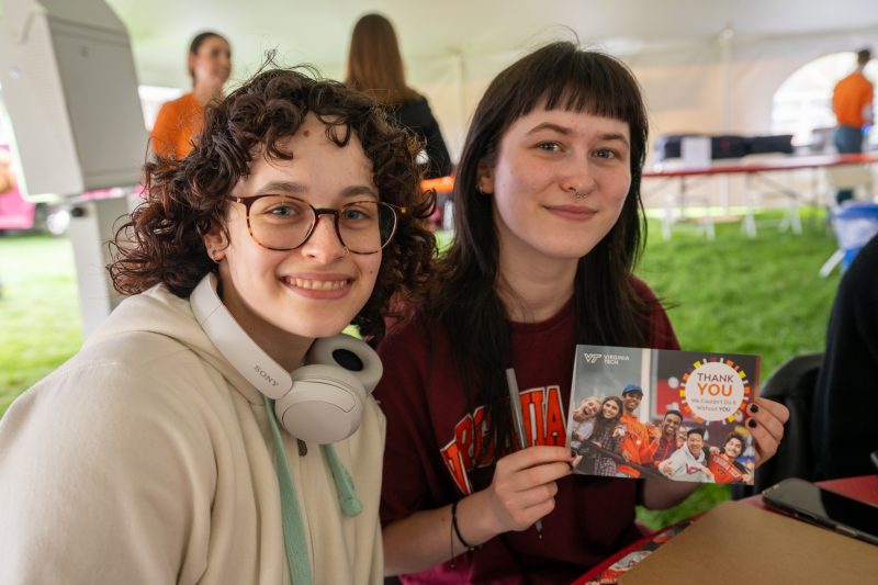Thank a Donor Day 2025 Photo of two students writing letters for Thank a Donor Day 2025.