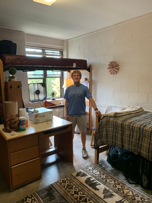 Student in dorm room.