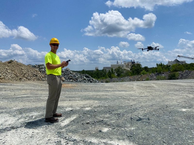 Student flies a drone.