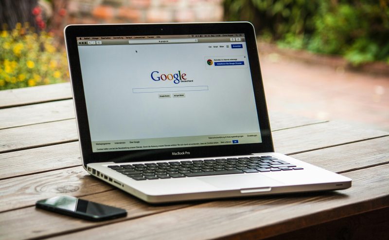 A laptop open to the Google homepage