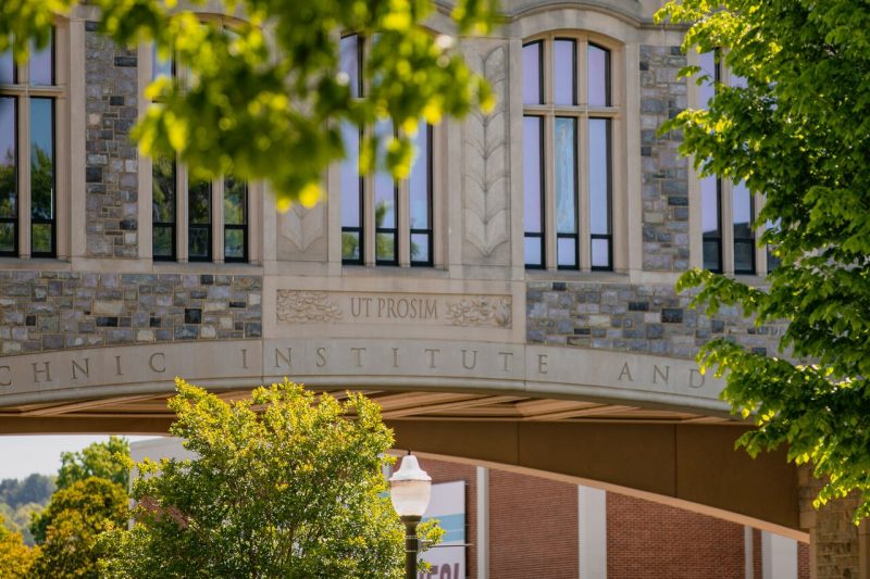 Ut Prosim The words "Ut Prosim," which means That I May Serve, is carved into the stone of a Virginia Tech building.