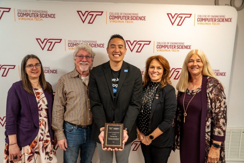 Computer science alumni with department head