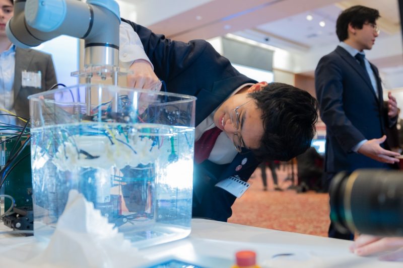 Thomas Lu - MDE Expo Thomas Lu observes his multifrequency histotripsy setup at the major design expo on April 23. Photo by Ben Murphy for Virginia Tech.