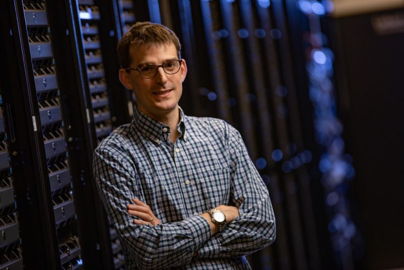 person posing for photos in data center