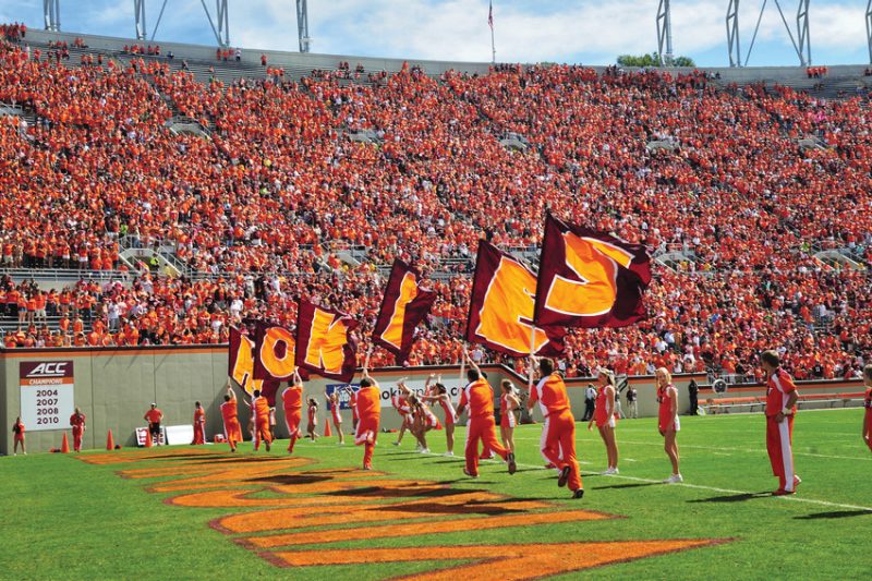Spirit squads hype the crowd before the 2014 Homecoming game against Western Michigan. Photo Chelsy Allder for Virginia Tech.