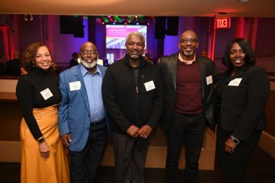 Black Hokie Excellence attendees pose for a photo at an event