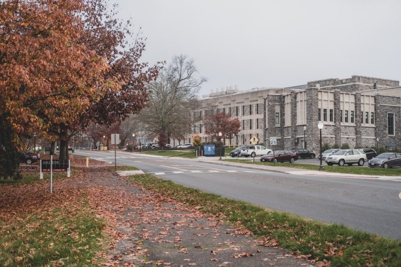 West Campus Drive featuring Hahn Hall South and connecting sidewalks in the fall. 