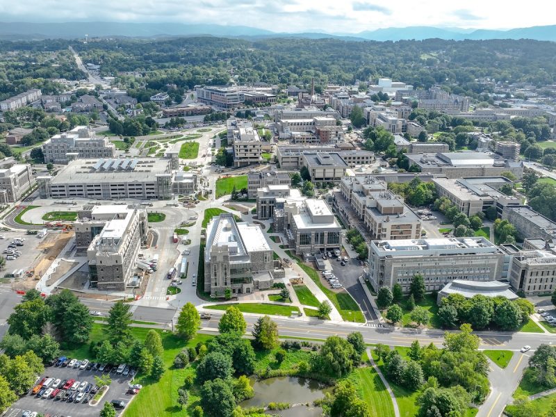 A drone view of Virginia Tech's Blacksburg campus featuring the North Academic District and surrounding area. 